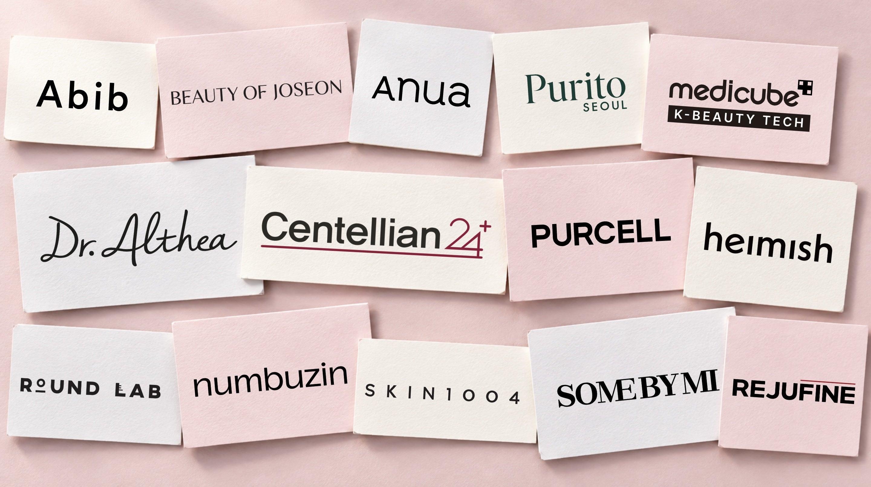 All 14 official Asian Beauty Collective brand logos arranged on softly colored editorial tiles